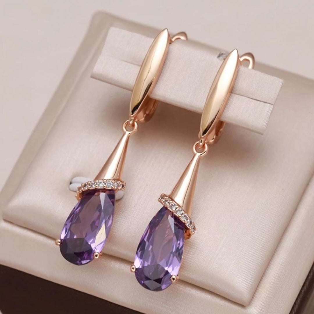 Aretes Elegantes de Circonita Morada en Oro