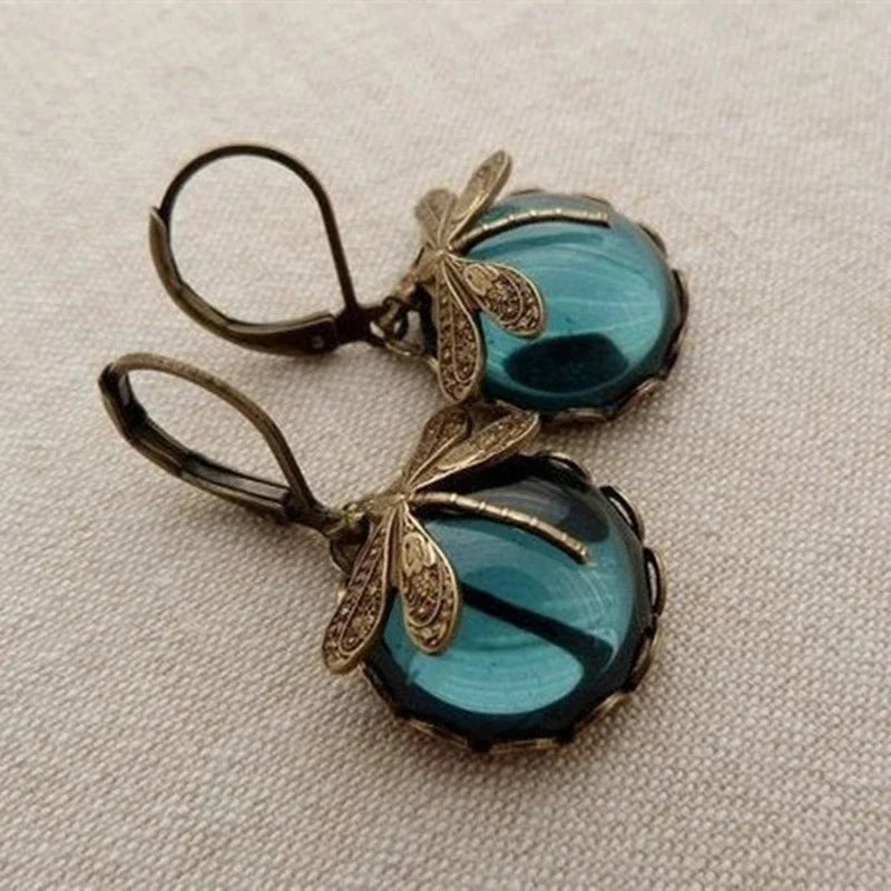Pendientes de Libélula con Cristal Azul en Oro Antiguo